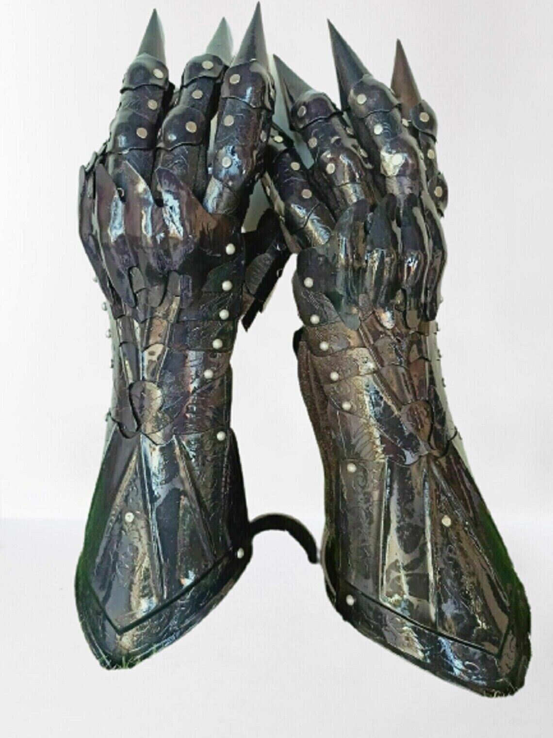 Medieval black metal gauntlets with gothic flair, perfect for crusader style
